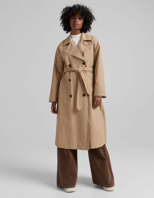 verbergen condensor Lijken Bershka - Lange trenchcoat in beige | ASOS