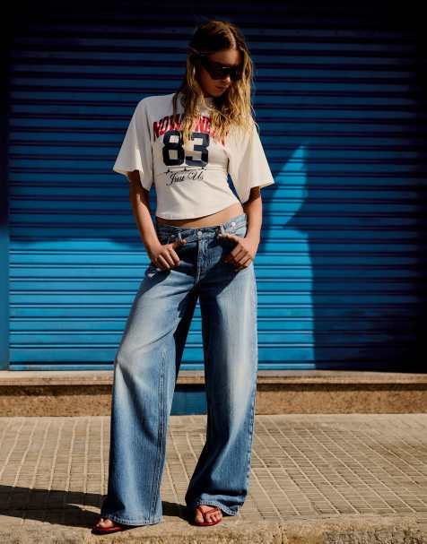 Bershka lavtaljede jeans med krydset talje i lyseblå - view 1