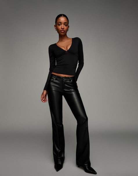 Bershka Leather effect boot-cut trousers in black