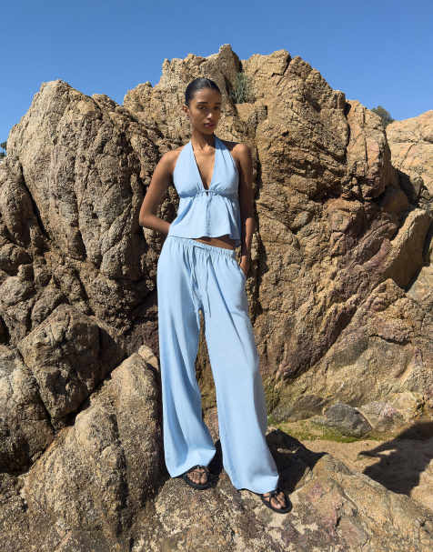 Bershka Linen blend trousers with an elasticated waistband in light blue