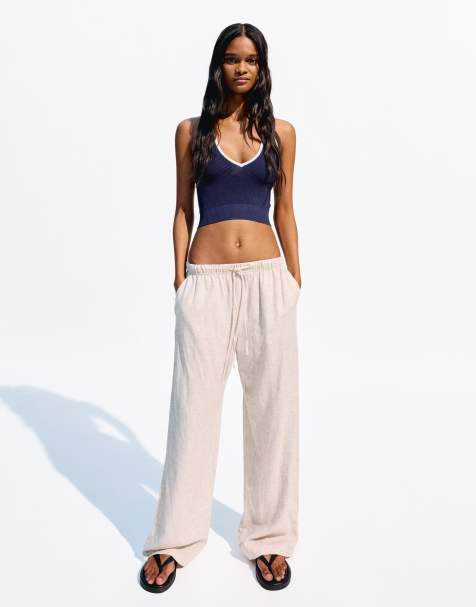 Bershka Linen blend trousers with an elasticated waistband in white cream - view 1