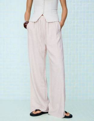 Bershka linen rich trousers with an elasticated waistband in light sand - BEIGE-Neutral
