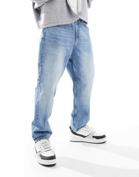 Bershka – Locker geschnittene Jeans in verwaschenem Mittelblau - view 1