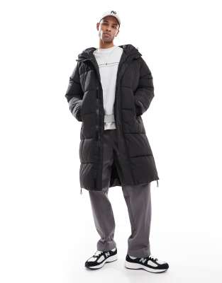 longline puffer coat in black