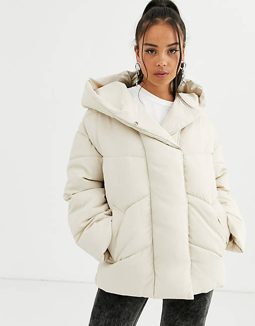 Bershka longline puffer coat with hood in cream | ASOS