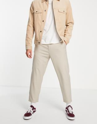 Bershka loose fit formal trousers in beige | ASOS