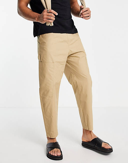 Bershka loose fit lightweight trousers with pocket in beige