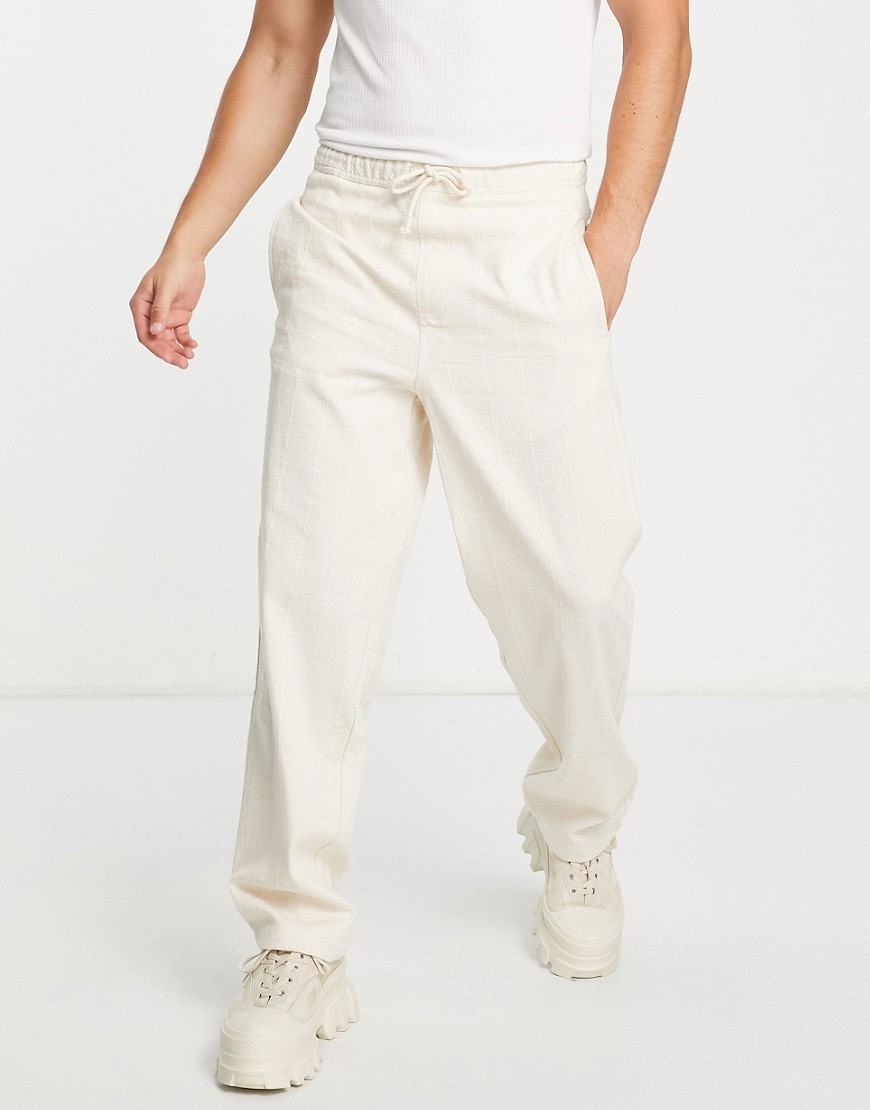 Bershka loose fit textured trousers in beige-Neutral