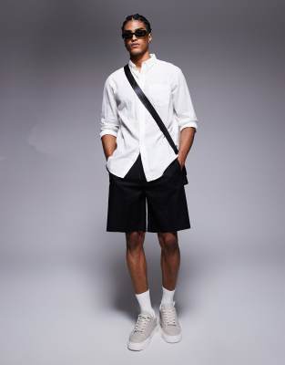 Bershka loose linen blend jogger bermuda shorts in black - view 1