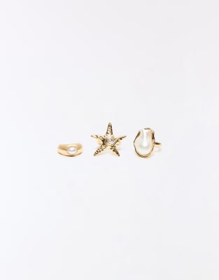 Bershka - Lot de bagues à détail étoile de mer - Doré