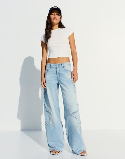 Bershka Low-rise boyfriend jeans with stars in mid blue - view 1