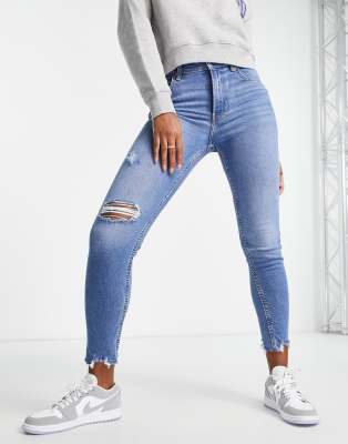 Bershka Bershka low waist skinny jean with rips in medium blue