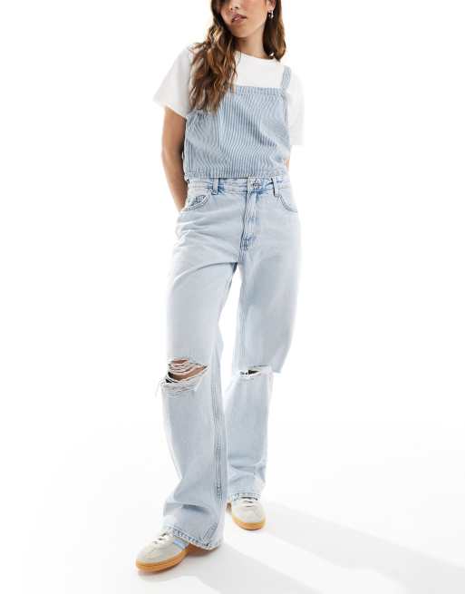 Bershka - Lyseblå jeans med vide ben og flænger på knæene