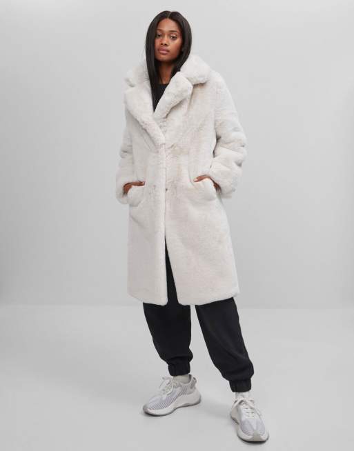 manteau fausse fourrure ecru