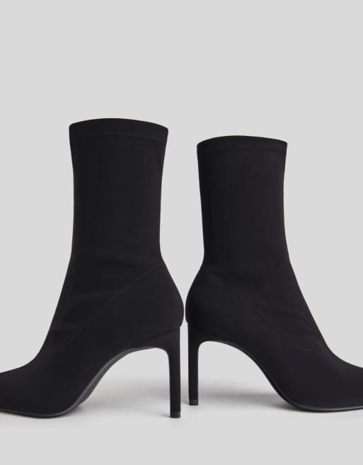 Bershka mid heeled sock ankle boot in black