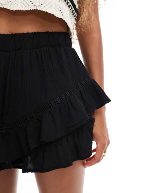 Bershka mini rara skirt in black