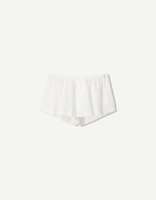 Bershka mini shorts with buttons in white | ASOS
