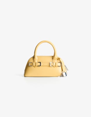 Bershka - Mini-Tasche aus Kunstleder in Gelb