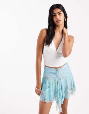 Bershka - Minirock in Blau mit Paisleymuster und geraffter Seite