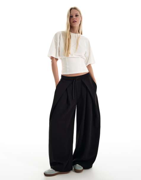 Bershka Neoprene effect wide-leg trousers with stoppers in black
