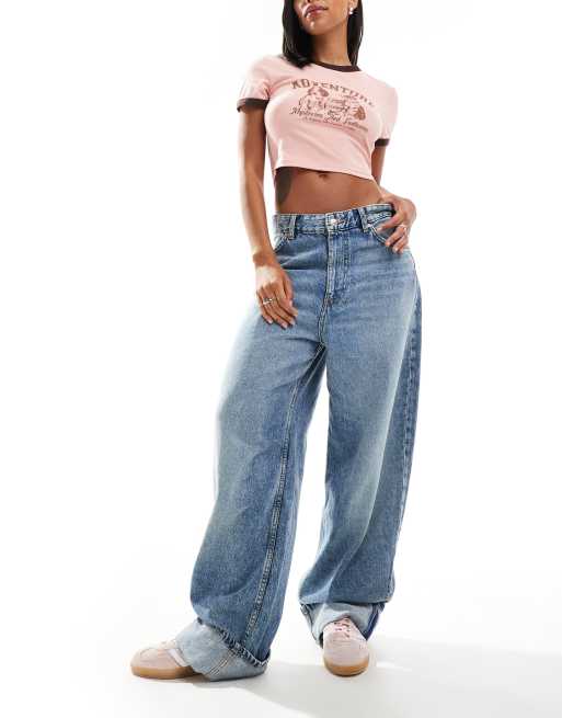 Bershka – Niebieskie jeansy z balonowymi nogawkami i szerokimi wywijanymi mankietami