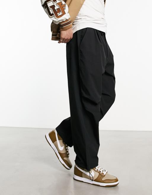 Bershka nylon parachute pants in black