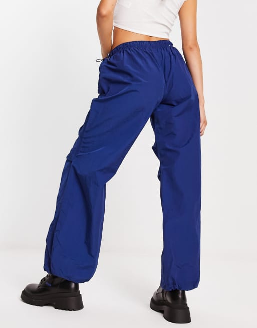 Bershka nylon parachute pants in blue