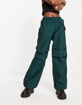Bershka nylon parachute pants in dark green - ASOS Price Checker