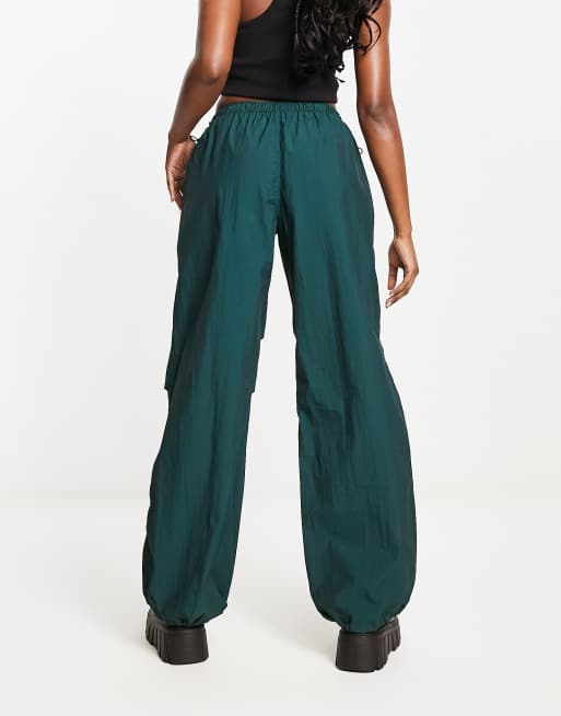 Bershka nylon parachute pants in dark green