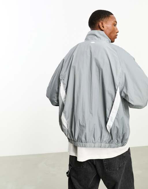 Bershka nylon reflective panel windbreaker in grey | ASOS