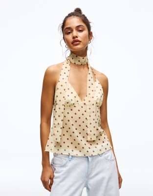 Bershka - Oberteil in Gelb mit Polka Dots und Trägern mit Schaldesign