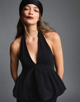 Bershka - Oberteil in Schwarz mit ballonförmigem Design