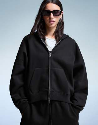 Bershka - Oversize-Kapuzenpullover in Schwarz mit Reißverschluss