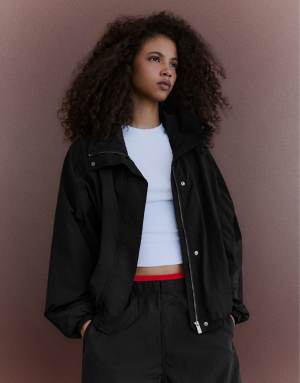 Bershka Oversize nylon batwing sleeve jacket in black