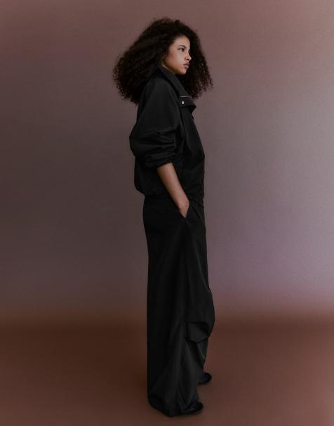 Bershka Oversize nylon batwing sleeve jacket in black - view 1