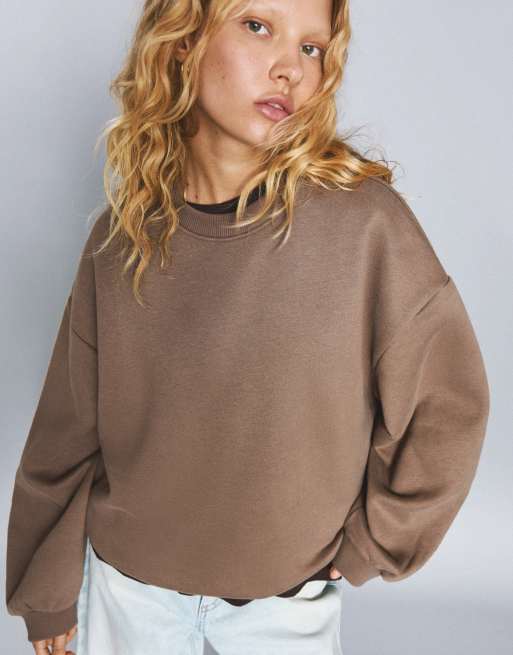 Bershka – Oversize-Sweatshirt in Beige mit Taschen