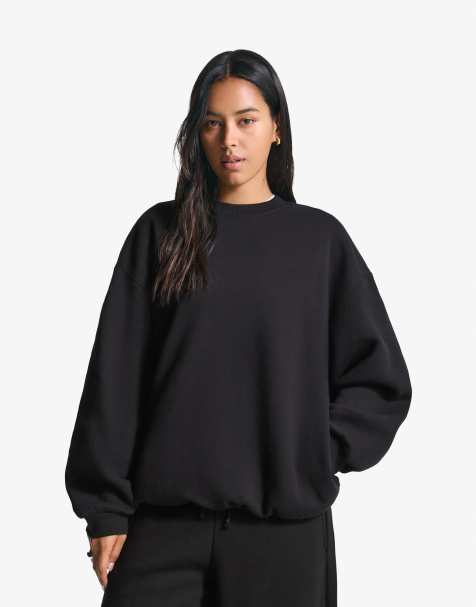 Bershka – Oversize-Sweatshirt in Schwarz mit Taschen - view 1