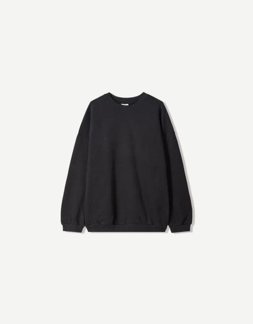 Bershka Oversize sweatshirt with pockets in black