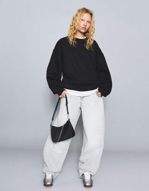 Bershka Oversize sweatshirt with pockets in black