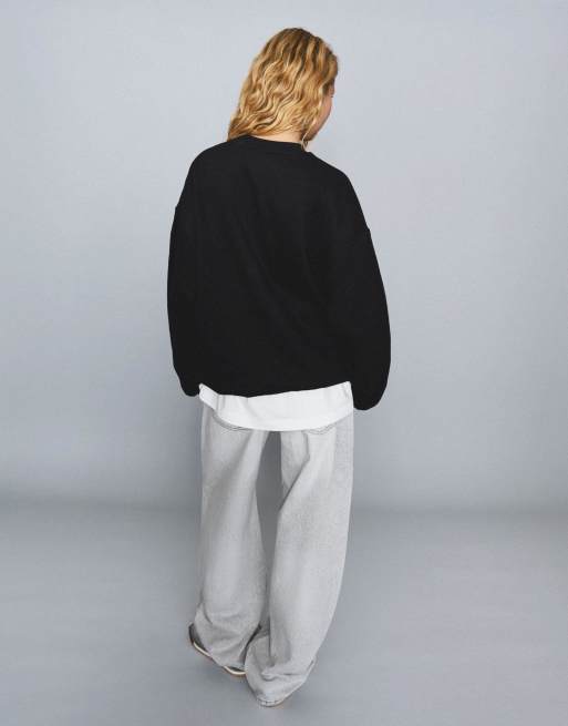 Bershka Oversize sweatshirt with pockets in black