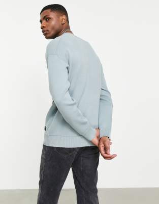 dress shirt and crew neck sweater