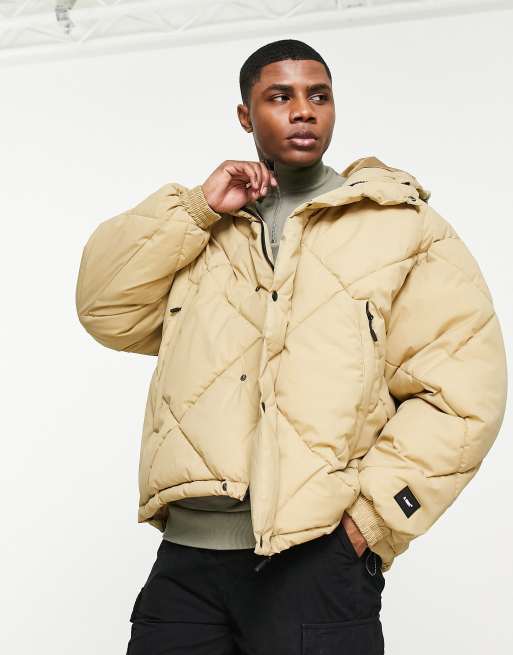 Bershka oversized puffer jacket in beige