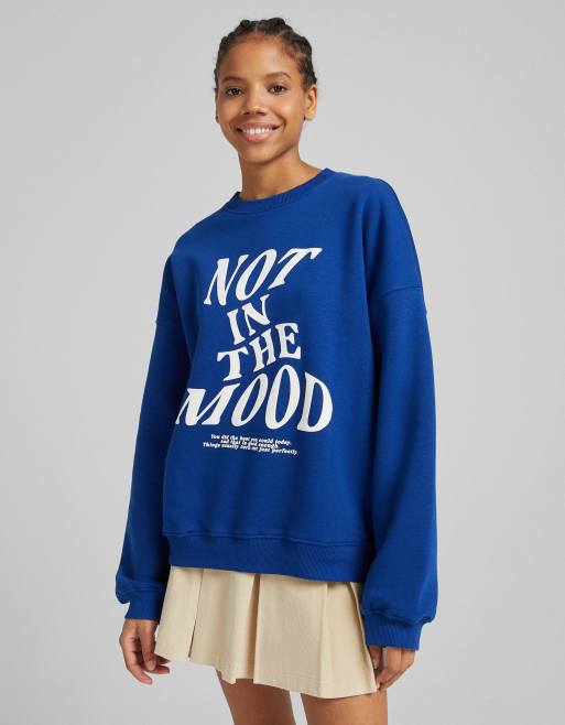 Bershka - Oversized sweater met slogan in jaren 70-stijl in kobaltblauw