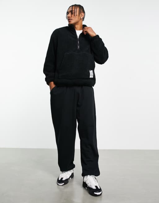 Bershka - Oversized teddy-trøje med halv lynlås i sort, imiteret lammeskind