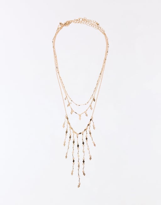 Bershka Pack of 3 layered chain necklaces in gold, 2 of 4