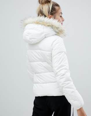 white padded jacket with fur hood