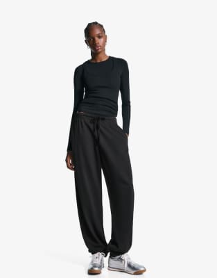 Bershka - Pantalon de jogging duveteux - Noir