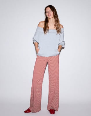 Bershka - Pantalon droit imprimé - Rouge