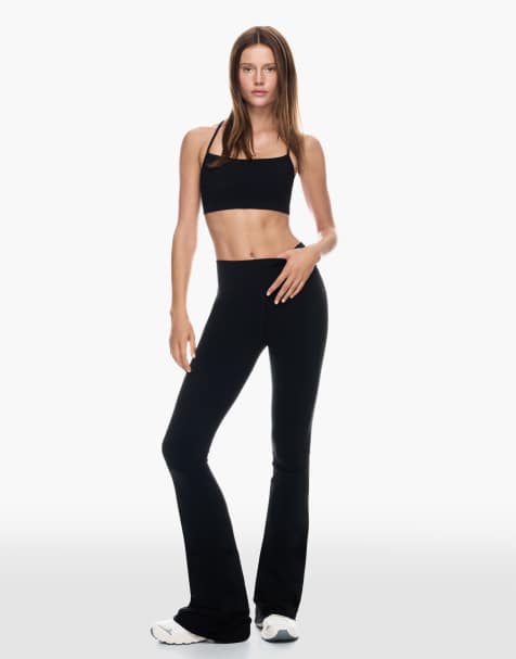 Bershka - Pantalon évasé en tissu technique - Noir - view 1
