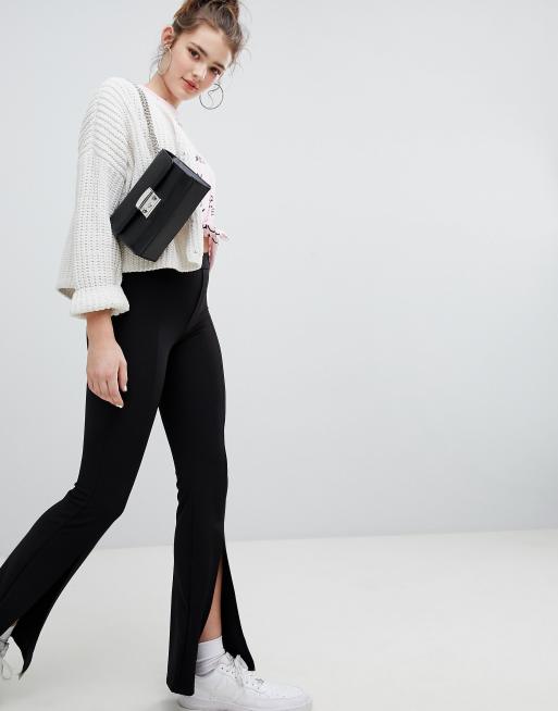 Pantalon noir avec fente devant new arrivals